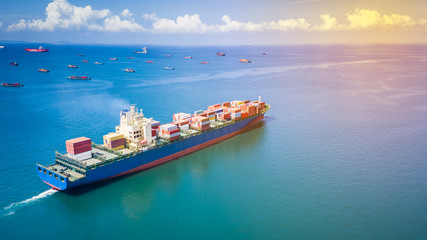 shipping container cargo business international inport ans export consumer product open sea aerial...