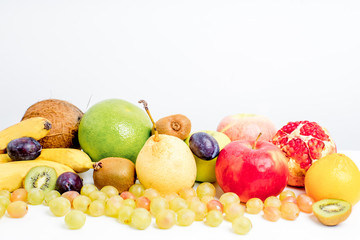 Creative layout made of fruits on a white background