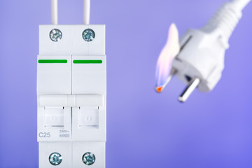 Electrical switch and plug of short circuit, flame. Safety electrical system of home.