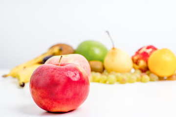 Creative layout made of fruits on a white background