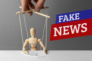 Fake News. The correspondent as the doll controls the puppeteer. False information to deceive people