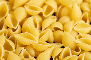 pasta on black background. Top view with copy space