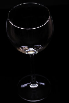 Wine glasses on a black background, silhouette, minimalism