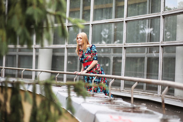 Girl in the street with an umbrella