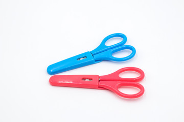 Scissors on white background