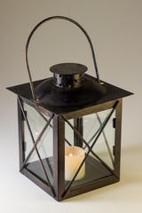 lantern with candle isolated on white 
