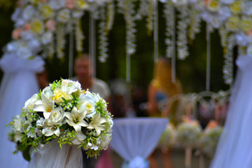 wedding bouquet on the background of the arch