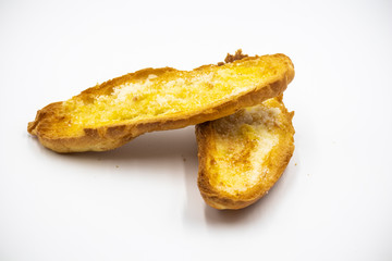 Toasted bread with sugar on white