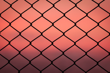 Fototapeta premium Iron metal wire chain link fence