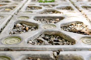 close up texture background stone. ornamental stones lined up on the ground in the park