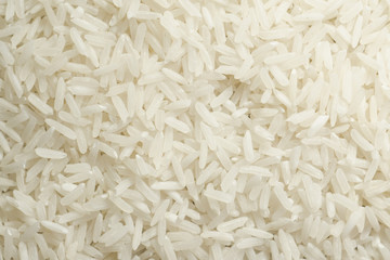 Texture of white long grain rice, background