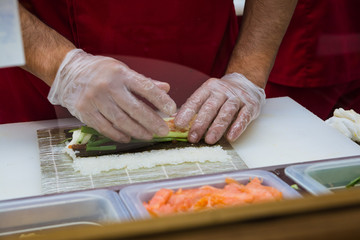 Sushi making at a fast food restaurant