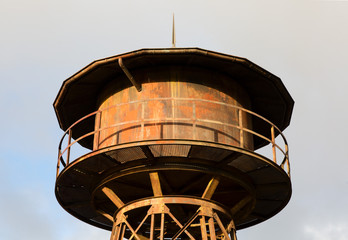 Fototapeta na wymiar Retro railroad water tower in the Netherlands.