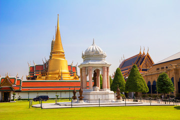 Fototapeta premium Bangkok, Thailand, temple of the emerald Buddha (Wat Phra Kaeo) in the Royal Palace. Temple of the emerald Buddha (Wat Phra Kaeo) is a complex, made in the traditional Thai style.