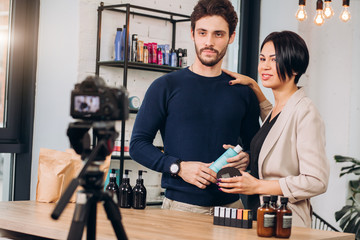 family business. young couple advertising makeup. close up photo.