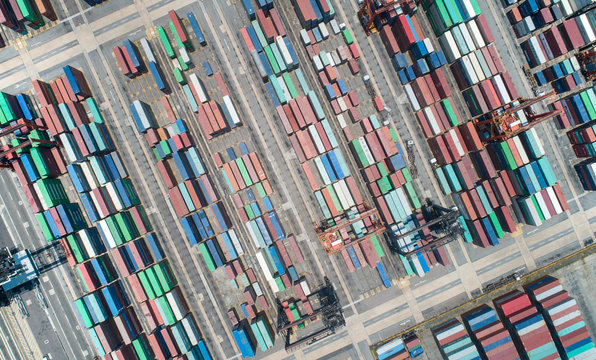 Global trade networks shipping containers from overhead. International supply chain commercial logistics industry Aerial view