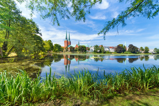 A view of the old town of Luebeck (German: L&uuml;beck), Germany, across the Mill Pond (German: M&uuml;hlenteich).
