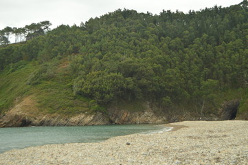 Beautiful White Sand Shore On Artedo Beach Surrounded By High Cliffs. July 30, 2015. Playa De Artedo, Artedo, Asturias, Spain.