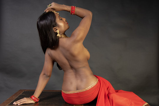 young indian woman in red lingerie