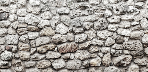 Old gray stone wall background photo