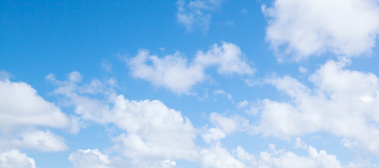 Blue sky with cumulus clouds