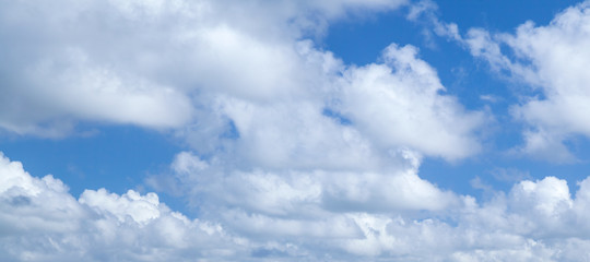 Naklejka na ściany i meble Blue sky with white cumulus clouds