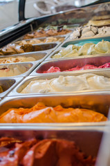 Photograph of homemade ice cream inside a refrigerator