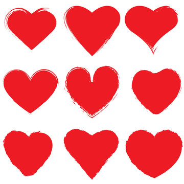Set of red ink grunge hearts on white background vector illustration. Brush stroke of hearts