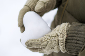 Snow heart in hand