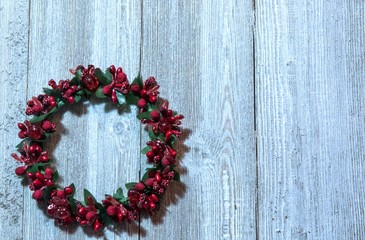 christmas wreath on wooden door