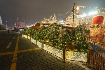 Obraz premium Moscow Red Square at last days of 2018 year. Illuminated GUM (central department store) looks like Palace.