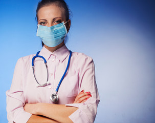 Young beautiful female doctor with stethoscope (Health, medicine, disease, treatment concept)