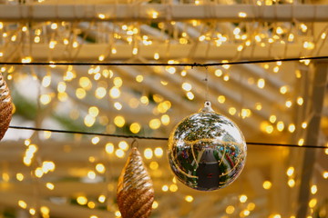 golden Christmas  balls, silve Christmas balls and small lights