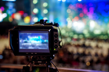 silhouette videographer had been recorded to blurred and bokeh countdown concert., Bangkok, Thailand.