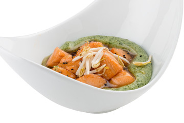 Salmon in sweet and sour sauce with mashed potatoes . Vegetarian dish. On white background