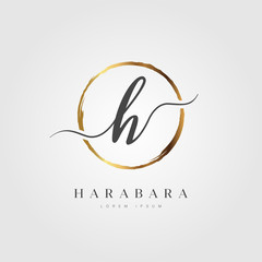 Elegant Initial Letter H Logo With Gold Circle Brushed