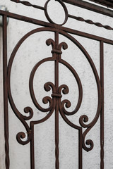 Fragment of a wrought-iron gate with an openwork pattern