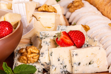 Dorblu cheese with mint, strawberry and nuts