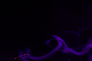 Colorful smoke close-up on a black background