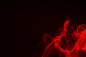 Colorful smoke close-up on a black background