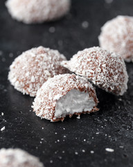 sweet mallow snowballs with chocolate coating and coconut