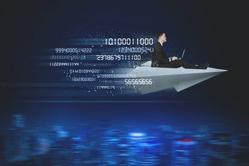 Businessman flies with paper plane and binary code