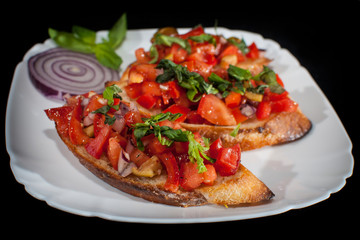 Tomato bruscretta appetiser on plate