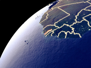 Satellite view of Gambia on Earth with city lights. Extremely detailed plastic planet surface with real mountains.