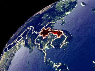Satellite view of Laos on Earth with city lights. Extremely detailed plastic planet surface with real mountains.