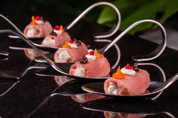 The beef paste wrapped in a piece of fresh meat