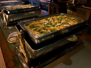 buffet style food in trays