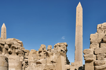 Ancient egyptian ruins with two obelisks in Luxor