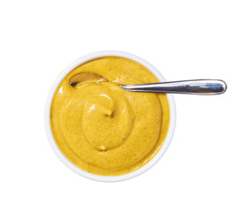 Mustard sauce in ceramic bowl isolated on white background. Top view
