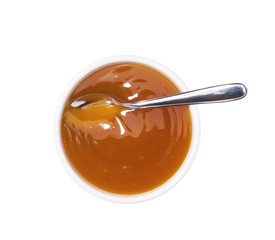 Chinese sauce, Sweet and sour sauce in ceramic bowl isolated on a white background.Top view